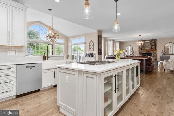 Chandelier, Fireplace, Interior, Kitchen, Pendant Lights, Recessed Lighting, Wood Texture Flooring