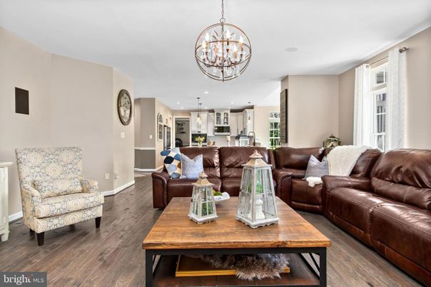 Chandelier, Interior, Kitchen, Living room, Pendant Lights, Recessed Lighting, Stainless Steel Appliances, Wood Texture Flooring