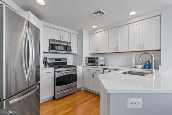 Interior, Kitchen, Recessed Lighting, Stainless Steel Appliances, Wood Texture Flooring