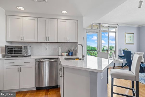 Dining room, Interior, Kitchen, Recessed Lighting, Stainless Steel Appliances, Wood Texture Flooring
