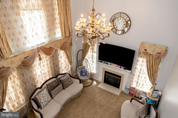 Chandelier, Fireplace, Interior, Living room