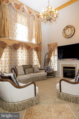 Chandelier, Fireplace, Interior, Living room