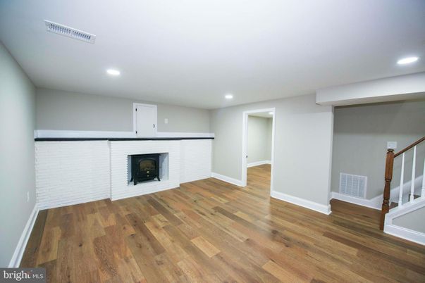 Empty room, Fireplace, Interior, Recessed Lighting, Wood Texture Flooring