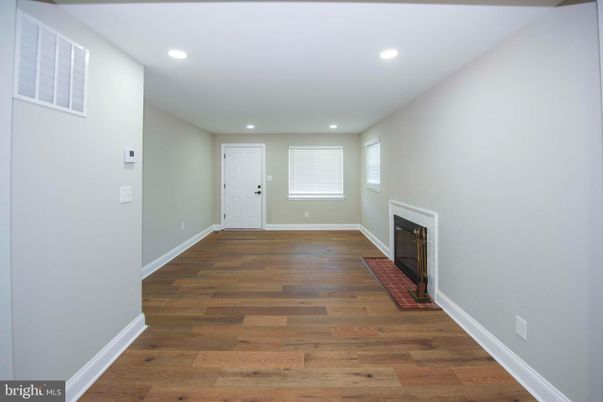 Empty room, Fireplace, Interior, Recessed Lighting, Wood Texture Flooring