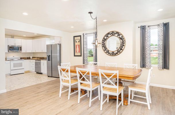 Dining room, Interior, Kitchen, Pendant Lights, Recessed Lighting, Stainless Steel Appliances, Wood Texture Flooring
