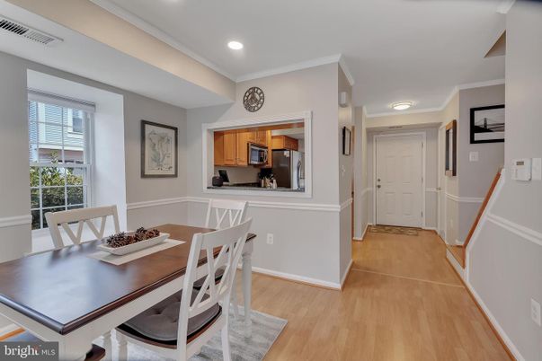 Dining room, Interior, Kitchen, Recessed Lighting, Stainless Steel Appliances, Wood Texture Flooring