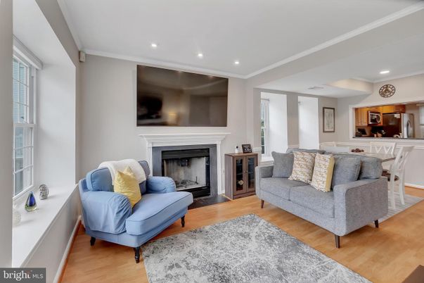 Dining room, Fireplace, Interior, Living room, Recessed Lighting, Wood Texture Flooring