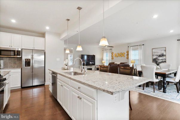 Dining room, Interior, Kitchen, Pendant Lights, Recessed Lighting, Stainless Steel Appliances, Wood Texture Flooring