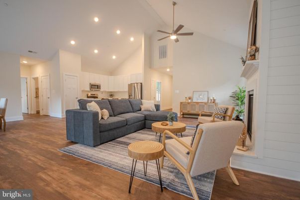 Fireplace, Interior, Kitchen, Living room, Recessed Lighting, Stainless Steel Appliances, Wood Texture Flooring