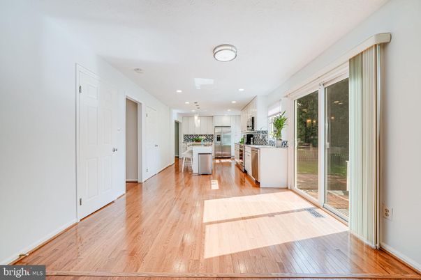 Dining room, Interior, Kitchen, Recessed Lighting, Stainless Steel Appliances, Wood Texture Flooring