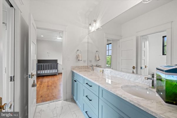 Bathroom, Dual Sink Vanities, Interior, Marble, Recessed Lighting, Wood Texture Flooring