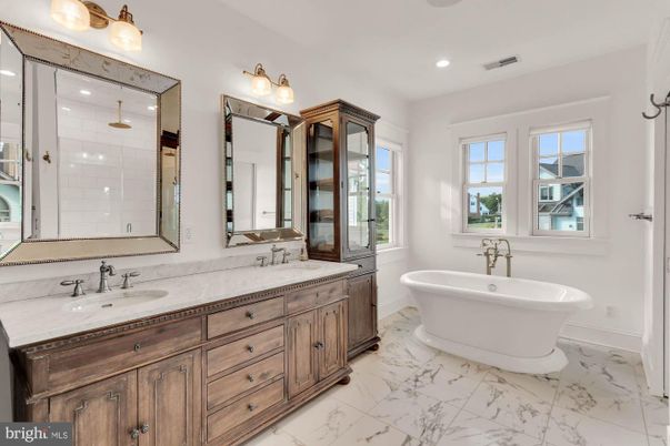 Bathroom, Dual Sink Vanities, Free Standing Baths, Glass Shower, Interior, Marble, Recessed Lighting