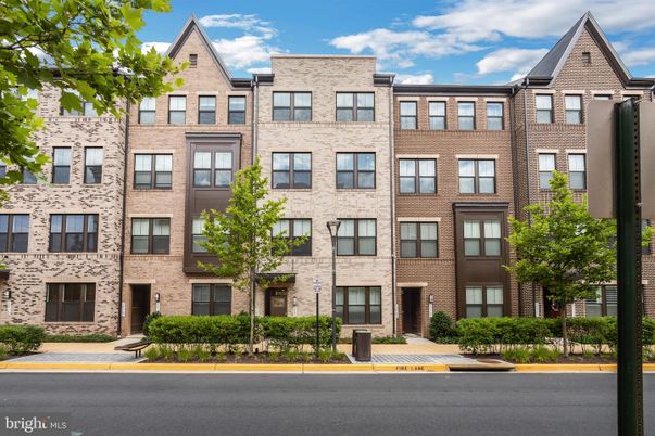 Exterior, Facade, Brick Facade, Condo Building