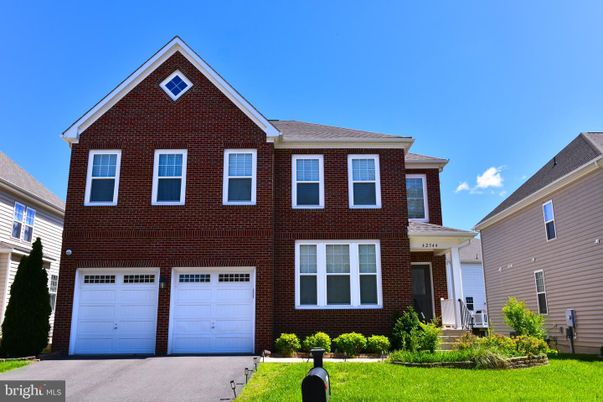 Attached, Exterior, Facade, Brick Facade, Brick Traditional