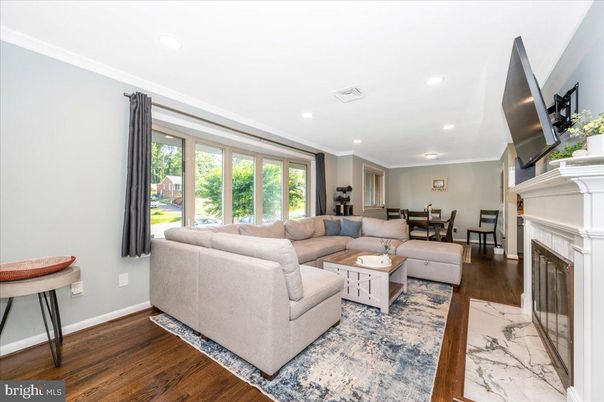 Dining room, Fireplace, Interior, Living room, Recessed Lighting, Wood Texture Flooring