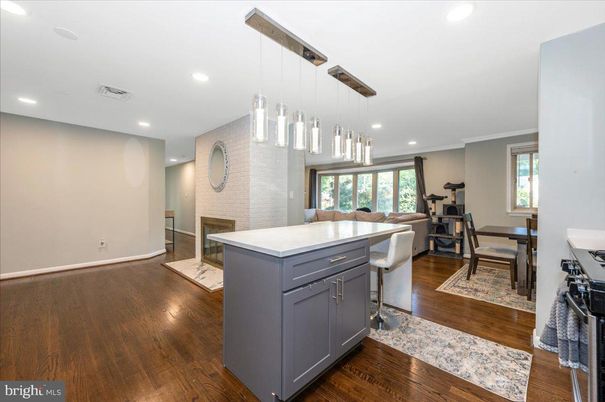 Dining room, Fireplace, Interior, Pendant Lights, Recessed Lighting, Wood Texture Flooring