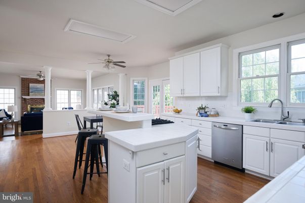 Dining room, Fireplace, Interior, Kitchen, Stone Walls, Tile Countertops, Wood Texture Flooring