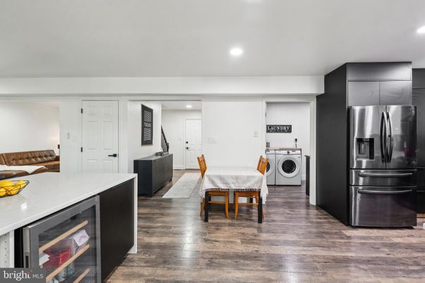 Dining room, Interior, Kitchen, Recessed Lighting, Utility Closets, Washer, Wood Texture Flooring