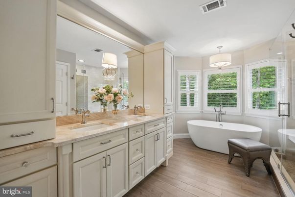 Bathroom, Dual Sink Vanities, Free Standing Baths, Interior, Recessed Lighting, Wood Texture Flooring