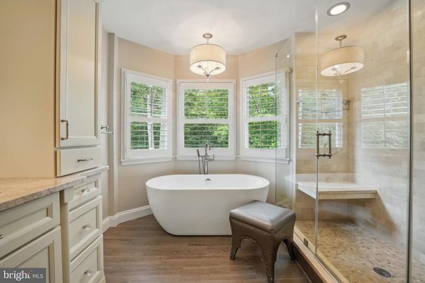 Bathroom, Free Standing Baths, Glass Shower, Interior, Recessed Lighting, Wood Texture Flooring