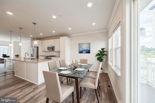 Dining room, Interior, Kitchen, Pendant Lights, Recessed Lighting, Stainless Steel Appliances, Wood Texture Flooring