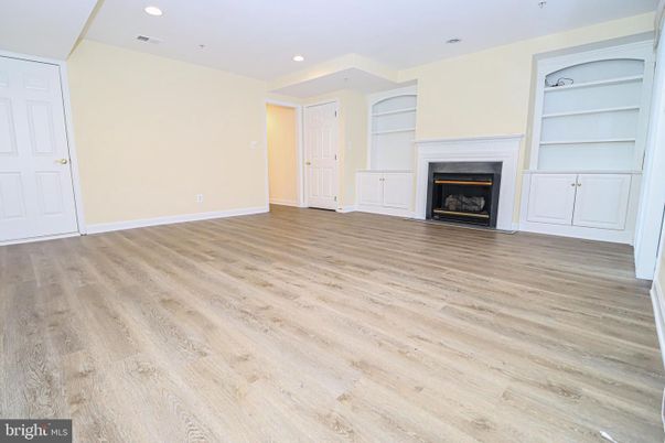 Empty room, Fireplace, Interior, Recessed Lighting, Wood Texture Flooring