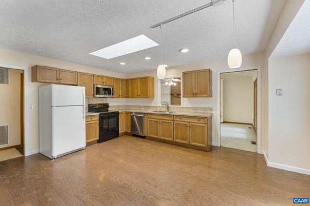 Interior, Kitchen, Pendant Lights, Recessed Lighting, Stainless Steel Appliances, Wood Texture Flooring