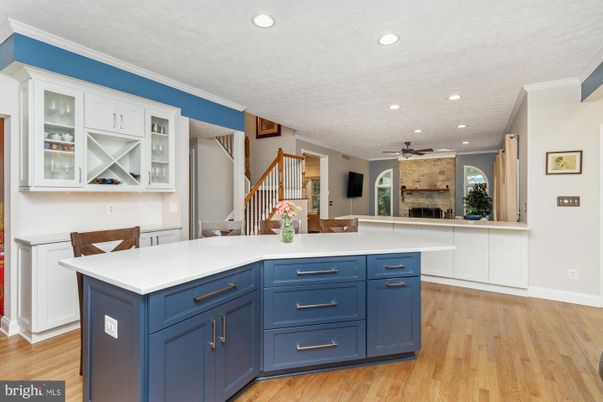 Fireplace, Interior, Kitchen, Recessed Lighting, Wood Texture Flooring