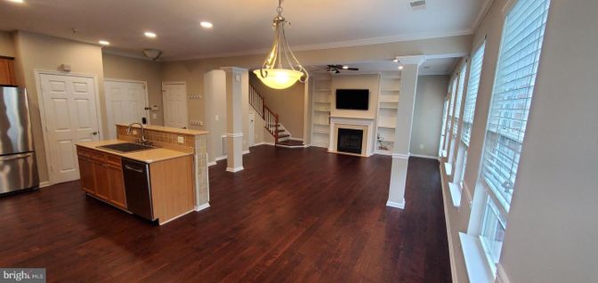 Fireplace, Interior, Kitchen, Pendant Lights, Recessed Lighting, Stainless Steel Appliances, Wood Texture Flooring