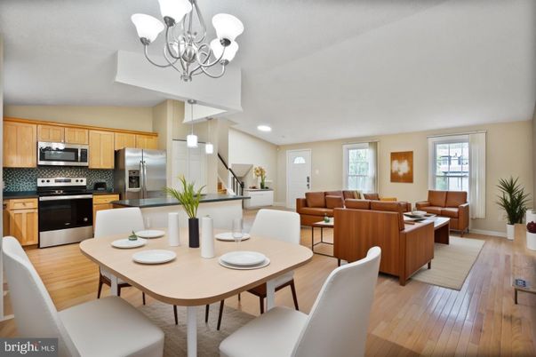 Chandelier, Dining room, Interior, Kitchen, Living room, Recessed Lighting, Stainless Steel Appliances, Wood Texture Flooring