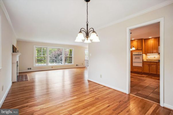 Chandelier, Empty room, Fireplace, Interior, Kitchen, Pendant Lights, Wood Texture Flooring