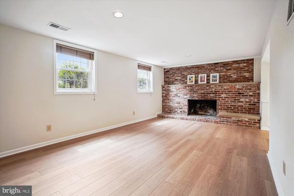 Empty room, Fireplace, Interior, Recessed Lighting, Stone Walls, Wood Texture Flooring
