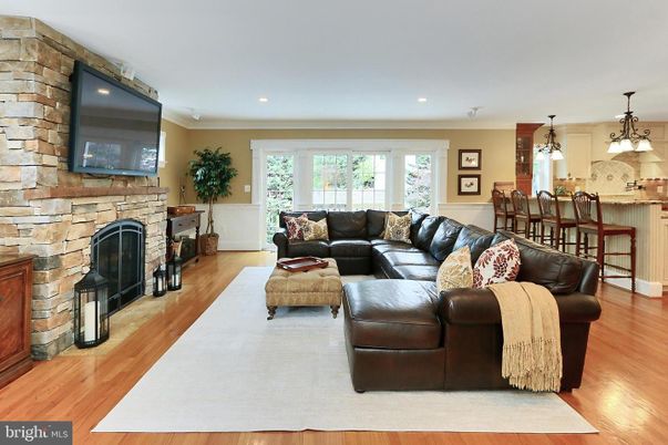 Fireplace, Interior, Living room, Pendant Lights, Recessed Lighting, Stone Walls, Wood Texture Flooring