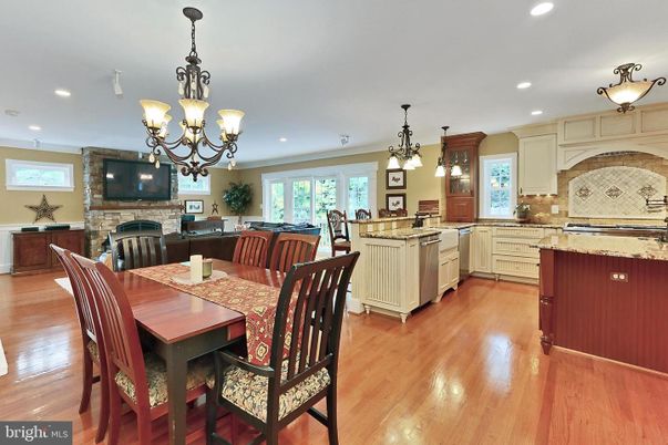 Chandelier, Dining room, Fireplace, Interior, Kitchen, Pendant Lights, Recessed Lighting, Wood Texture Flooring