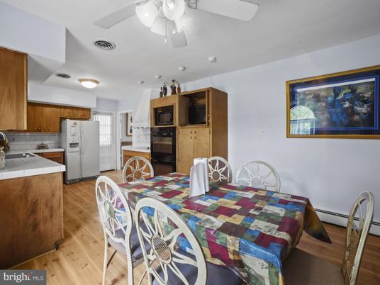 Dining room, Interior, Kitchen, Tile Countertops, Wood Texture Flooring