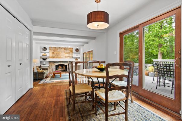 Dining room, Fireplace, Interior, Pendant Lights, Stone Walls, Wood Texture Flooring