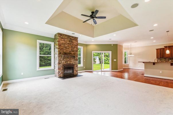Empty room, Fireplace, Interior, Pendant Lights, Recessed Lighting, Wood Texture Flooring