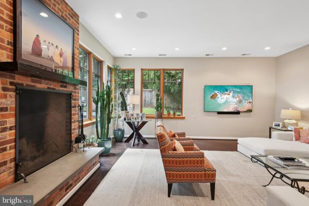 Fireplace, Interior, Living room, Recessed Lighting, Stone Walls, Wood Texture Flooring