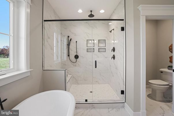 Bathroom, Free Standing Baths, Glass Shower, Interior, Marble, Marble Walls, Recessed Lighting