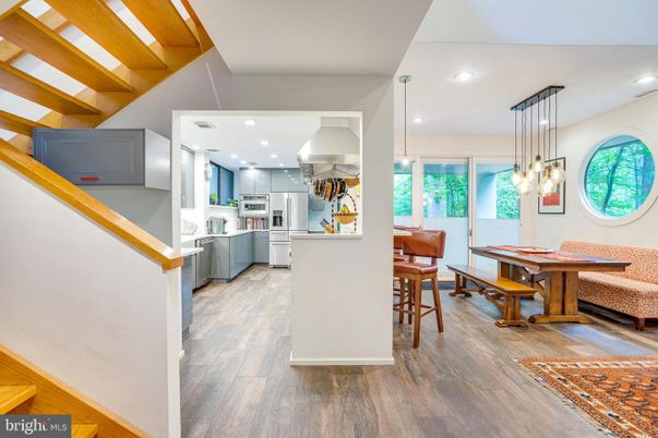 Dining room, Interior, Kitchen, Pendant Lights, Recessed Lighting, Stainless Steel Appliances, Wooden Beams, Wood Texture Flooring