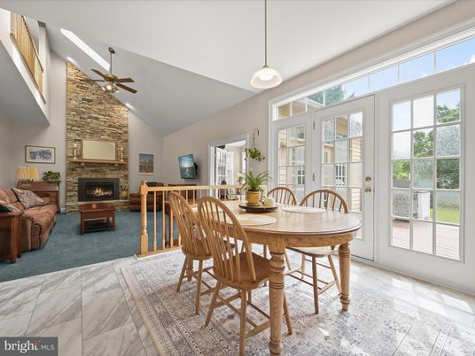 Dining room, Fireplace, Interior, Living room, Marble, Pendant Lights, Stone Walls