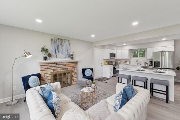Fireplace, Interior, Kitchen, Living room, Recessed Lighting, Stainless Steel Appliances, Wood Texture Flooring