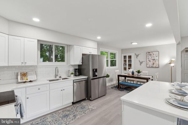 Dining room, Interior, Kitchen, Recessed Lighting, Stainless Steel Appliances, Wood Texture Flooring