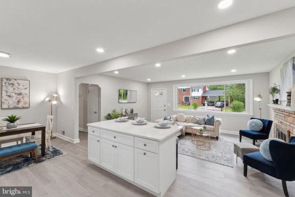 Dining room, Fireplace, Interior, Living room, Recessed Lighting, Wood Texture Flooring