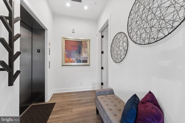 Elevator, Interior, Recessed Lighting, Wood Texture Flooring