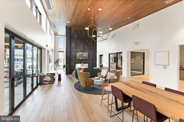 Chandelier, Dining room, Fireplace, Interior, Living room, Pendant Lights, Recessed Lighting, Wooden Ceilings, Wood Texture Flooring