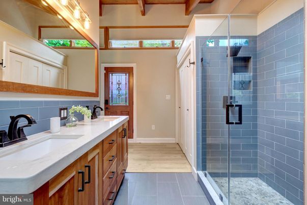 Bathroom, Dual Sink Vanities, Glass Shower, Interior, Wood Texture Flooring