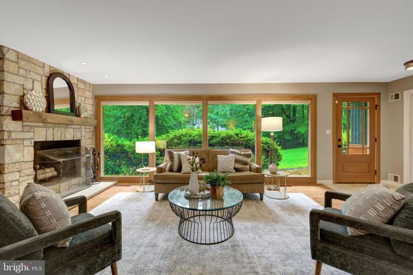 Fireplace, Interior, Living room, Recessed Lighting, Stone Walls, Wood Texture Flooring