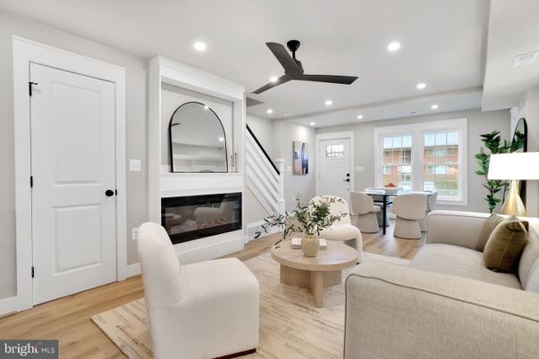 Dining room, Fireplace, Interior, Living room, Recessed Lighting, Wood Texture Flooring