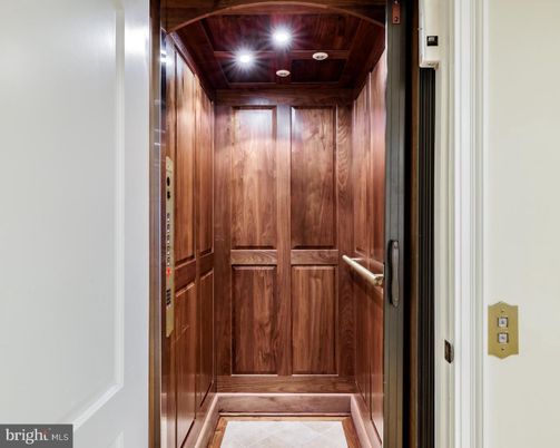 Elevator, Interior, Recessed Lighting, Wooden Ceilings, Wooden Walls